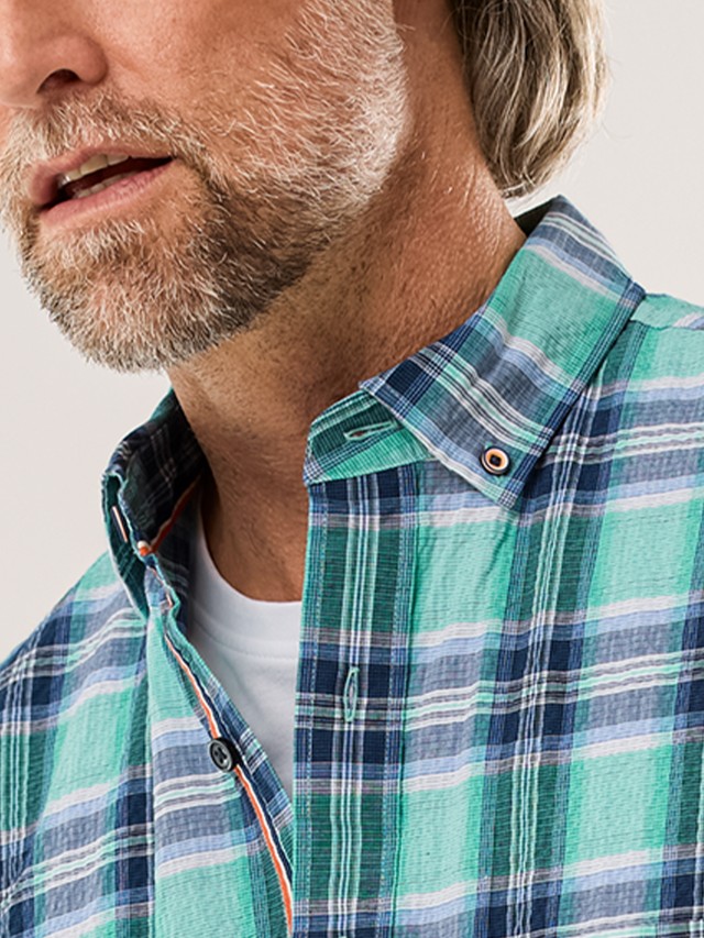 Abbildung Oberkörper Mann in Hemd mit Button-Down-Kragen