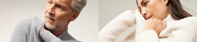 Ein Herr in einem grauen Pullover und eine Dame in einem beigen Pullover