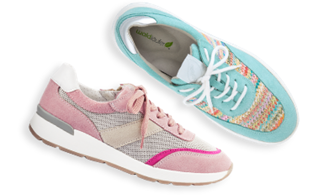 Zwei einzelne Hallux-Schnürer in rosa und türkies